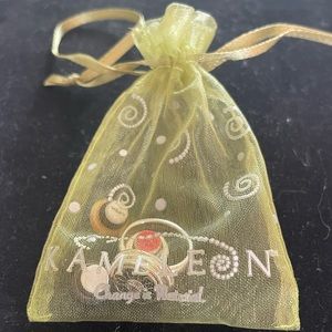 Kameleon ring set with 4 charms; brand new